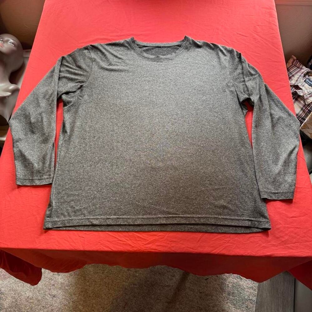 Gray heather longsleeve shirt Reading: “We Are Driven” back & Stryker on sleeve.